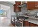 Close up on kitchen appliances with a stainless oven and microwave at 6672 E Horned Owl Trl, Scottsdale, AZ 85266