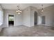 Open living space with tile flooring, neutral walls, and access to other rooms at 6672 E Horned Owl Trl, Scottsdale, AZ 85266