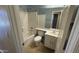 Well-lit bathroom featuring a shower-tub combo, a mirror, and a vanity with storage space at 6722 W Shannon St, Chandler, AZ 85226