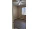 Cozy bedroom featuring wood-look flooring and a bright window at 6722 W Shannon St, Chandler, AZ 85226