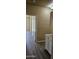 Hallway with modern flooring and white cabinets in view at 6722 W Shannon St, Chandler, AZ 85226