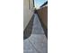 Concrete walkway along the side of the house, leading to a gated entrance at 6722 W Shannon St, Chandler, AZ 85226