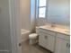 Clean bathroom with dual sinks, modern cabinetry, and a shower-tub combination at 7209 E Blissful Breeze Ln, San Tan Valley, AZ 85143