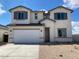 Charming two-story home featuring a spacious two-car garage and neutral color scheme at 7209 E Blissful Breeze Ln, San Tan Valley, AZ 85143
