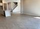 Open-concept living space featuring tile floors and a seamless transition to the kitchen area at 7209 E Blissful Breeze Ln, San Tan Valley, AZ 85143