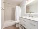 Bright bathroom features tile shower, stylish vanity, and modern fixtures, for a comfortable retreat at 728 E State Ave, Phoenix, AZ 85020