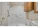 Clean bathroom with a walk-in shower, grab bars, and neutral decor at 7750 E Broadway Rd # 361, Mesa, AZ 85208