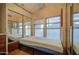 Bedroom featuring mirrored closet doors and a window at 7750 E Broadway Rd # 361, Mesa, AZ 85208