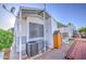 Cozy mobile home featuring a well-maintained exterior, storage unit, and air conditioning unit at 7750 E Broadway Rd # 361, Mesa, AZ 85208