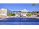 Inviting mobile home offering a covered carport, front porch with stairs, and a lush, landscaped yard at 7750 E Broadway Rd # 361, Mesa, AZ 85208