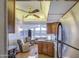Open kitchen with seamless access to the living room, creating a combined and inviting space at 7750 E Broadway Rd # 361, Mesa, AZ 85208