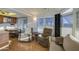 Comfortable living area with neutral tones and a cozy sitting arrangement at 7750 E Broadway Rd # 361, Mesa, AZ 85208