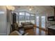Bright and inviting living room with large windows, comfortable seating, and ample natural light at 7750 E Broadway Rd # 361, Mesa, AZ 85208