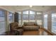 Bright living room featuring many windows, comfortable seating, and a warm, inviting atmosphere at 7750 E Broadway Rd # 361, Mesa, AZ 85208