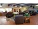 Welcoming lobby showcases stylish leather seating, fireplace, and reception desk for residents and guests at 7750 E Broadway Rd # 361, Mesa, AZ 85208