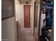 Hallway with closet and doorway to bathroom at 8651 E Royal Palm Rd # 118, Scottsdale, AZ 85258