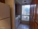 Bright laundry room features a washer and dryer, natural light, and ample storage at 8651 E Royal Palm Rd # 118, Scottsdale, AZ 85258
