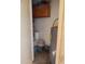 A utility room featuring a water heater and storage space, providing essential home systems at 8651 E Royal Palm Rd # 118, Scottsdale, AZ 85258