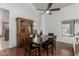Inviting dining room with dark wood furniture and bright lighting at 9203 S Heather Dr, Tempe, AZ 85284