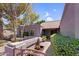 Charming home with desert landscaping, tile roof, secure gate and covered front entrance at 9203 S Heather Dr, Tempe, AZ 85284