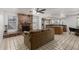 Spacious living room with a brick fireplace and an adjacent kitchen at 9203 S Heather Dr, Tempe, AZ 85284