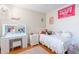 Bright bedroom with a vanity, makeup mirror, bed and playful decor at 9451 E Becker Ln # 2016, Scottsdale, AZ 85260