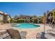 A serene community pool offers a great space to unwind and enjoy the sunshine at 9451 E Becker Ln # 2016, Scottsdale, AZ 85260