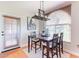 Dining room features a modern light fixture and large window at 9451 E Becker Ln # 2016, Scottsdale, AZ 85260