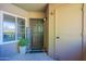 Inviting entryway with a welcome sign, decorative pot, and neutral tones at 9451 E Becker Ln # 2016, Scottsdale, AZ 85260
