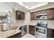 Kitchen with stainless steel appliances, granite countertops, and a mosaic backsplash at 9451 E Becker Ln # 2016, Scottsdale, AZ 85260