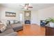Cozy living room with a fireplace, comfortable sectional sofa, and natural light at 9451 E Becker Ln # 2016, Scottsdale, AZ 85260
