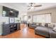 Inviting living room features a comfortable sectional sofa and entertainment center at 9451 E Becker Ln # 2016, Scottsdale, AZ 85260