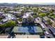 Aerial view of a community tennis court surrounded by lush landscaping and well-maintained grounds at 9451 E Becker Ln # 2016, Scottsdale, AZ 85260