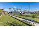 Bocce ball courts surrounded by mature trees at 10311 E Trent Ave, Mesa, AZ 85212