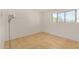 Bright bedroom with neutral walls, a large window, and tile flooring at 1052 S San Jose St # 6, Mesa, AZ 85202
