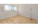 Simple bedroom with large window for natural light and neutral-colored walls at 1052 S San Jose St # 6, Mesa, AZ 85202