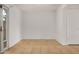 Neutral room with tiled flooring, natural light, and access to another room at 1052 S San Jose St # 6, Mesa, AZ 85202