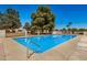 Relaxing community pool area perfect for cooling off on a hot day with clear blue water and ample seating at 1052 S San Jose St # 6, Mesa, AZ 85202