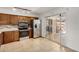 Well-equipped kitchen with stainless steel appliances, granite countertops, and tiled flooring at 1052 S San Jose St # 6, Mesa, AZ 85202