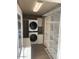 Efficient laundry room with washer, dryer, and ample storage space at 111 S Greenfield Rd # 785, Mesa, AZ 85206