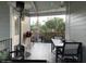 Relaxing covered patio with outdoor seating and heater overlooking desert landscape at 111 S Greenfield Rd # 785, Mesa, AZ 85206