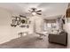 Inviting living room showcases neutral colors, lots of natural light, and comfortable seating at 13159 W Caribbean Ln, Surprise, AZ 85379