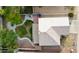 An aerial view showcases the home's spacious backyard, landscaping, and covered patio at 13261 W Gelding W Cir, Surprise, AZ 85379
