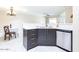 Eat-in kitchen featuring stainless steel appliances, white countertops, and wood-look tile flooring at 14300 W Bell Rd # 222, Surprise, AZ 85374