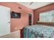Bedroom with flat screen television and closet access at 145 N 74Th St # 240, Mesa, AZ 85207