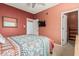Bedroom with flat screen television and closet access at 145 N 74Th St # 240, Mesa, AZ 85207