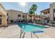 Well-maintained community pool and sun deck with lounge chairs for residents to enjoy at 145 N 74Th St # 240, Mesa, AZ 85207