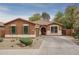 Charming single-story home with a well-maintained yard and inviting curb appeal at 15140 W Glenrosa Ave, Goodyear, AZ 85395