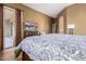 Spacious main bedroom featuring hardwood floors and patio access with an abundance of natural light at 16600 W Washington St, Goodyear, AZ 85338
