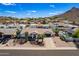 Aerial view showcasing the charming home with a pool and meticulously maintained desert landscaping at 1811 E Tierra Buena Ln, Phoenix, AZ 85022
